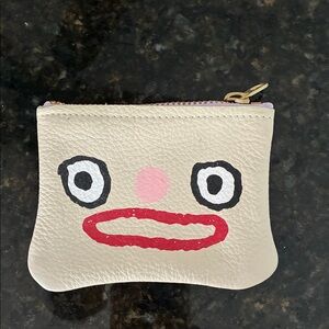 Playful Cream Leather Coin Pouch with Face Design